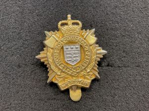Royal Logisics Corps (RLC) bi-metal cap badge.