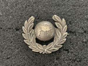 Royal Marines Police 1922-49 service cap or sweetheart badge.