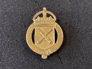 WW1 War Munitions Volunteer brass lapel badge