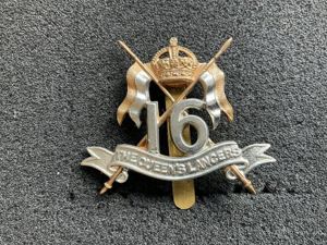 WW2 16th The Queens Lancers b/m cap badge by Firmin.