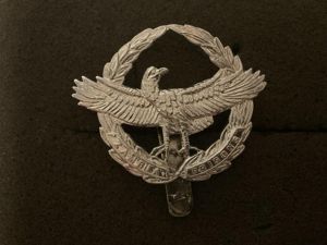 Zambia Prisons cap badge by Firmin.