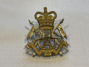 British Army Light Cavalry Band cap badge.