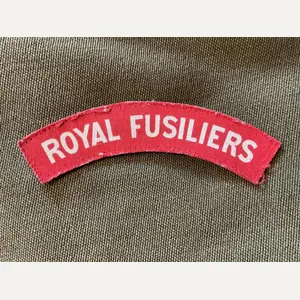 WW2 Printed ROYAL FUSILIERS shoulder title, removed from uniform.