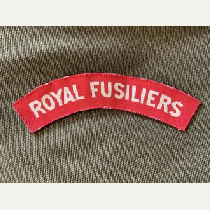 WW2 Printed ROYAL FUSILIERS shoulder title.
