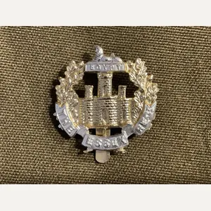 Anodised Essex Regiment cap badge by FIRMIN LONDON.
