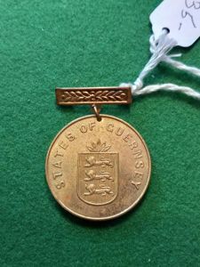 A LIBERATION OF GUERNSEY MEDAL / RARE ITEM.