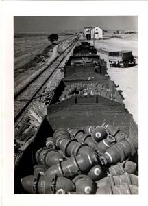 Photograph of Railroad Cars Delivering Aerial Bombs in Italy – …
