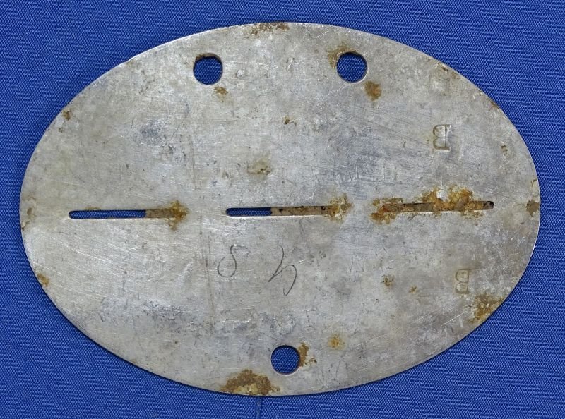 WWII German Erkennungsmarke Identification Disk: '1284 1. Stamm Kp. Gren. Ers. Btl. 61' — image 2