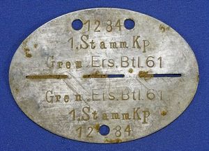 WWII German Erkennungsmarke Identification Disk: '1284 1. Stamm Kp. Gren. …