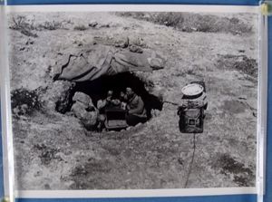 1942 Official Photograph: Afrika Korps Soldiers Eat in a Bunker