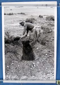 1942 Official Photograph: Afrika Korps Soldier Digs a Bomb Shelter