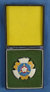 Cased WWII Greater Japan Air Defense Association Meritorious Member Badge