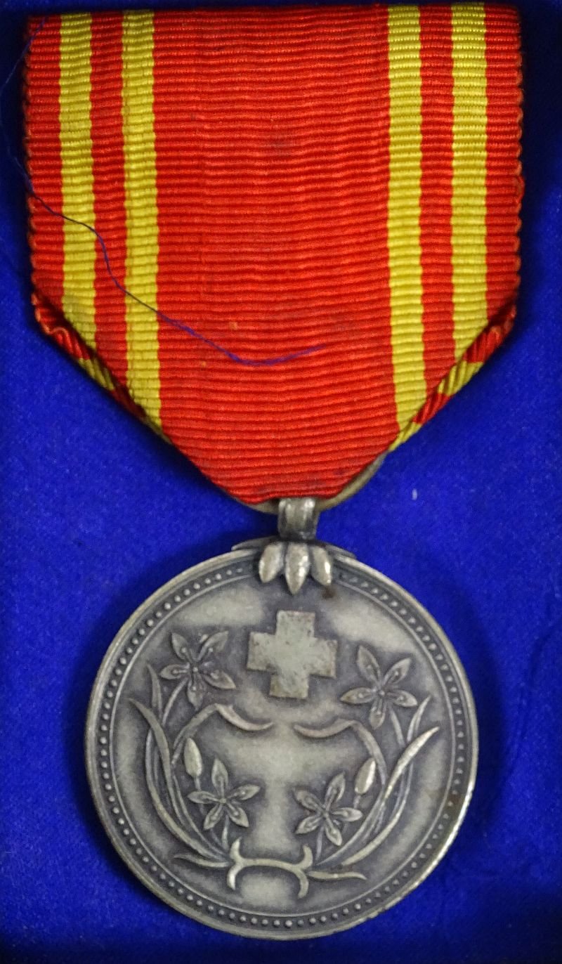 Cased Manchuko Red Cross Member Medal — image 2