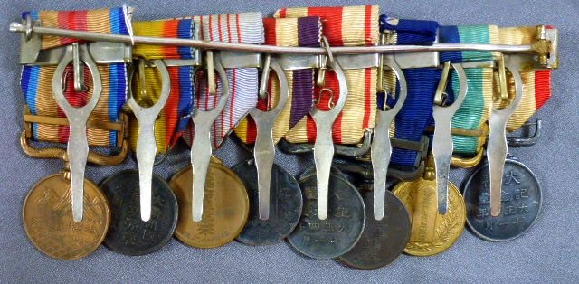 Imperial Japanese / Manchuko 8 Place Medal Bar — image 4
