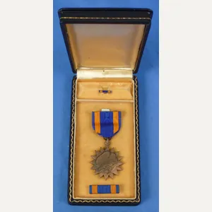 Cased WWII Air Medal on a Full Wrap Brooch Suspension