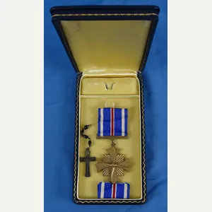 Cased WWII Distinguished Flying Cross with Rosary Crucifix