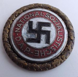 LARGE GOLD PARTY BADGE NAMED!