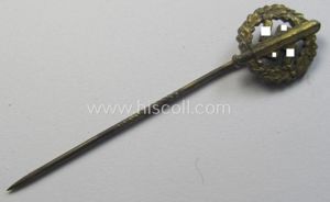 Attractive, example of a miniature lapel-pin depicting a: 'SA-Sportabzeichen in …
