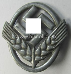 Silverish-golden-toned - and I deem 'Feinzink'-based - cap-badge (ie. 'Hutabzeichen') …