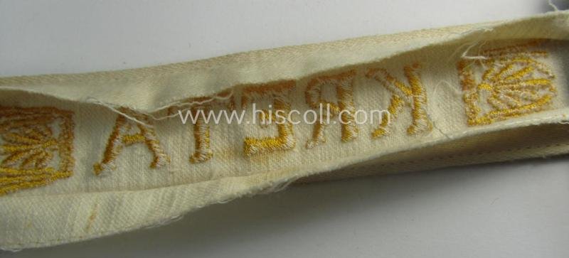 WH cuff-title (ie. 'Ärmelstreifen') entitled: 'Kreta' (being an example that bears a printed 'RbN.'-numeral) and that comes in a surely issued albeit simply never worn nor once tunic-attached, condition — image 5