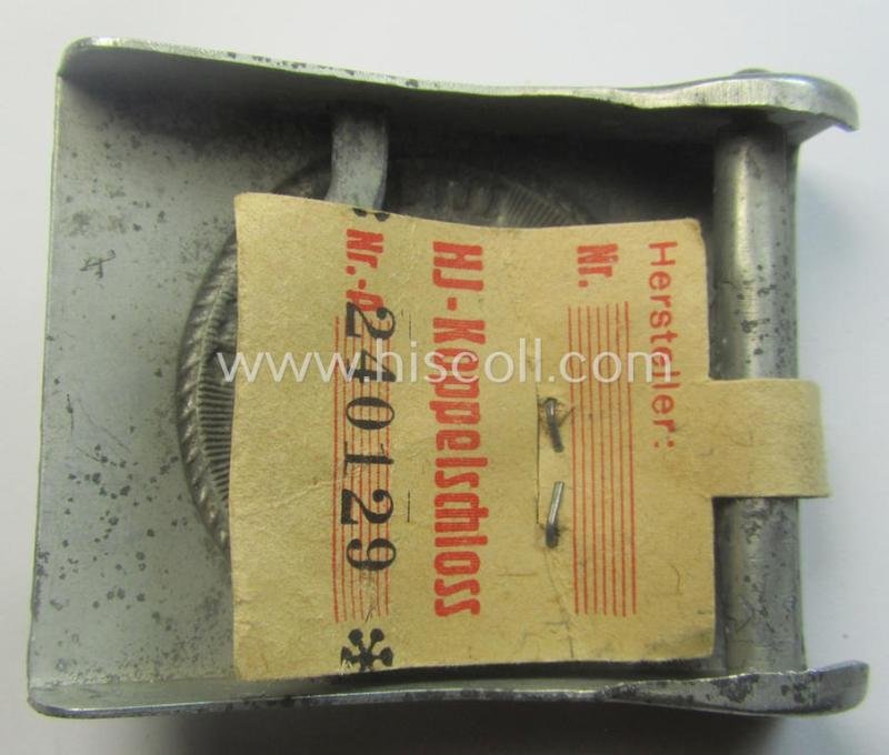 HJ ('Hitlerjugend'), zinc-based belt-buckle being a 'virtually mint' and/or non-maker-marked example having a seldomly seen 'cranked-catch'-set-up and that comes with its period 'RzM'-etiket still attached — image 3