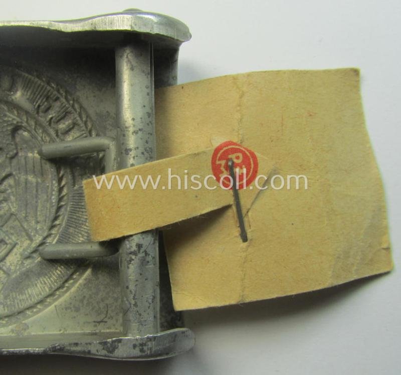 HJ ('Hitlerjugend'), zinc-based belt-buckle being a 'virtually mint' and/or non-maker-marked example having a seldomly seen 'cranked-catch'-set-up and that comes with its period 'RzM'-etiket still attached — image 4