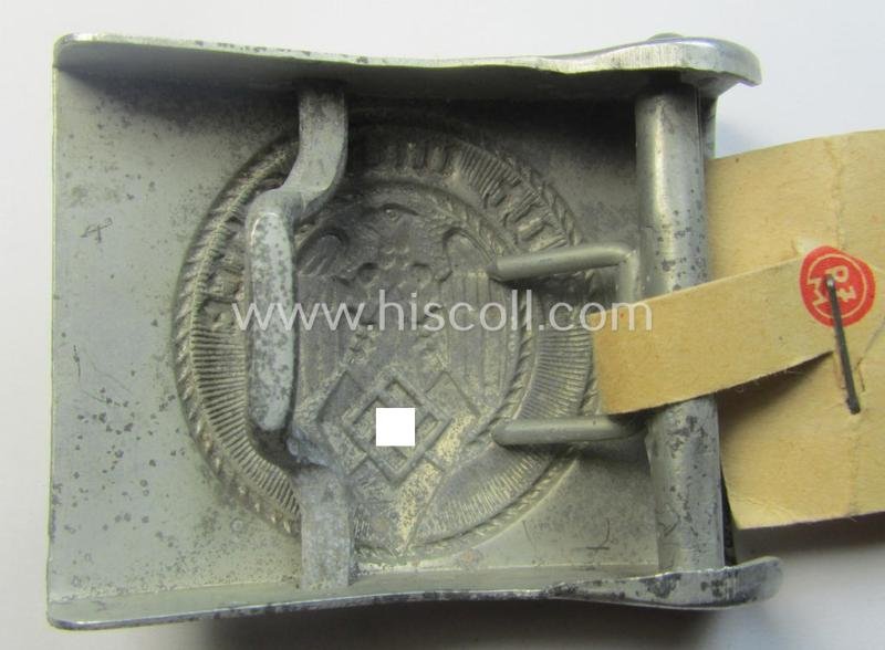HJ ('Hitlerjugend'), zinc-based belt-buckle being a 'virtually mint' and/or non-maker-marked example having a seldomly seen 'cranked-catch'-set-up and that comes with its period 'RzM'-etiket still attached — image 5