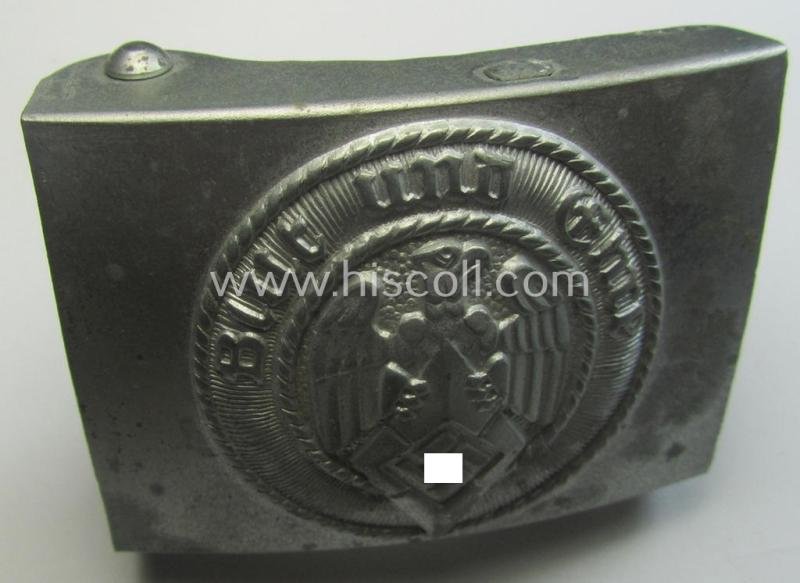 HJ ('Hitlerjugend'), zinc-based belt-buckle being a 'virtually mint' and/or non-maker-marked example having a seldomly seen 'cranked-catch'-set-up and that comes with its period 'RzM'-etiket still attached — image 6