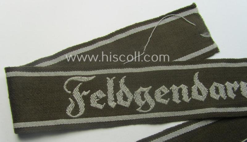 WH (Heeres) cuff-title ie. armband (ie. 'Ärmelstreifen') entitled: 'Feldgendarmerie' (being a typical 'semi-BeVo'-woven example) — image 2