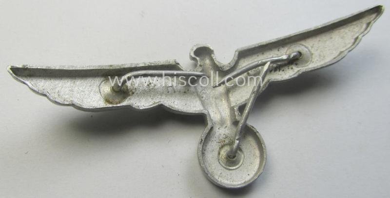 WH (Heeres) bright-silver-toned (ie. typical aluminium-based), EM- (ie. NCO- or officers') type visor-cap-eagle being a maker- (ie. 'R.H.'-) marked and/or: '1938'-dated example that comes in a moderately used- ie. once cap-attached-, condition — image 3