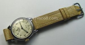 WH (Kriegsmarine) WWII-period wrist-watch (or: 'Dienstuhr') of the make: 'K.M. …