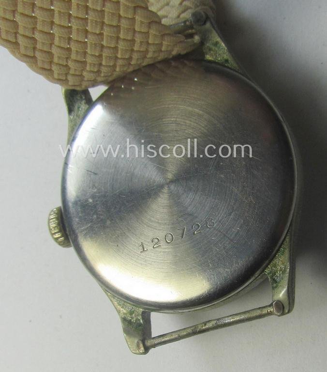 WH (Kriegsmarine) WWII-period wrist-watch (or: 'Dienstuhr') of the make: 'K.M. Siegerin' having a beige-white-coloured dial-plate and neatly engraved number on its back that reads: '120728' — image 4