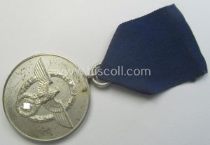 Bright-silver-toned so-called: 'Polizei-Dienstauszeichnung 3. Stufe' (or: police loyal-service medal 3rd …