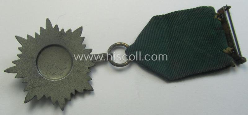 WH-related so-called: 'Verdienstauszeichnung für Angehörige der Ostvölker, 2. Klasse in Silber ohne Schwerter', being a typical non-maker-marked- and/or: 'Feinzink'-based example that comes mounted on its period ribbon — image 3