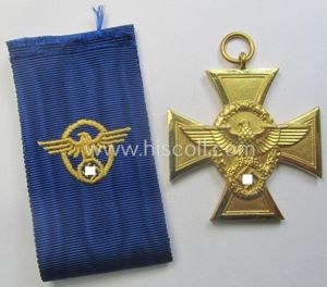 Golden-class 'Pol.-Dienstauszeichnung 1. Stufe' (or: police loyal-service medal first-class) that …