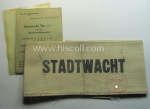 Unusual, beige/white-coloured- and/or printed-linnen-based 'Polizei' (ie. police-) related armband (ie. …