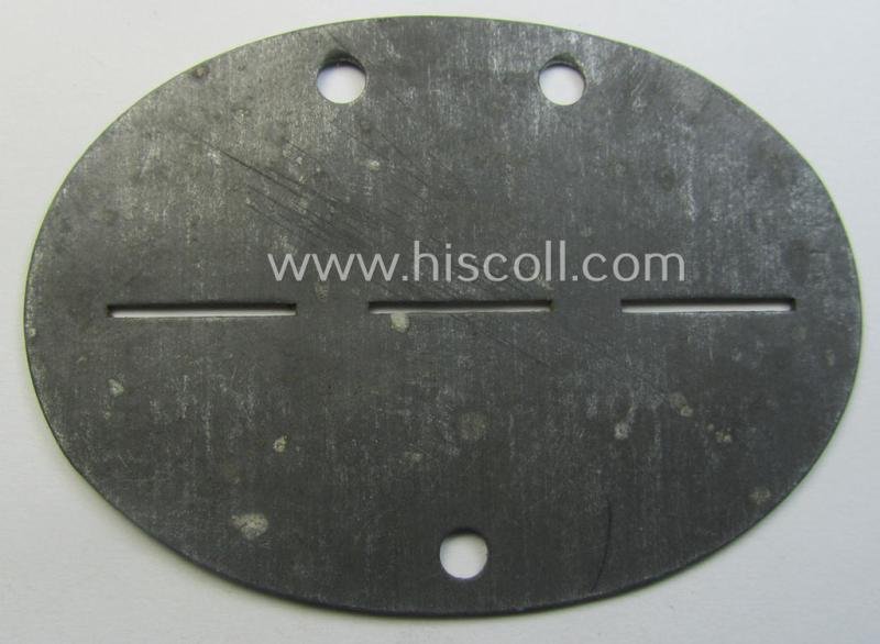 Zinc-based, WH (Heeres) 'Infanterie o. Panzerjäger'-related ID-disc bearing the clearly stamped unit-designation that reads: 'Inf.Pz.Jäg.Ausb.Kp.68' and that comes as issued and/or worn — image 2