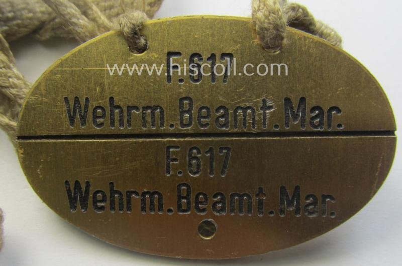 Unusually found - albeit 'standard-issue'-pattern - WH (Kriegsmarine) typical aluminium-based- and/or bright golden-bronze toned ID-disc (ie. 'Erkennungsmarke') bearing the engraved coded numeral (ie. text) that simply reads: 'F.617 Wehr.Beamt.Mar.' — image 2