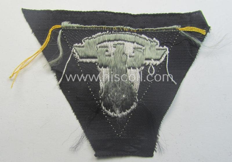 N.S.K.K. (ie. 'National Socialistisches Kraftfahr Korps') side-cap-eagle (ie. 'Adler für N.S.K.K.-Schiffchen o. Lagermütze') being a 'BeVo'-wove'-example onto a bright-grey-coloured background — image 3