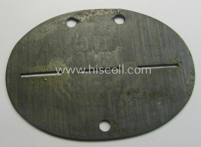 Zinc-based, WH (Heeres) 'Grenadiere'-related ID-disc bearing the clearly stamped unit-designation that reads: 'Stammkomp.G.E.B.338' and that comes as issued and/or worn — image 2