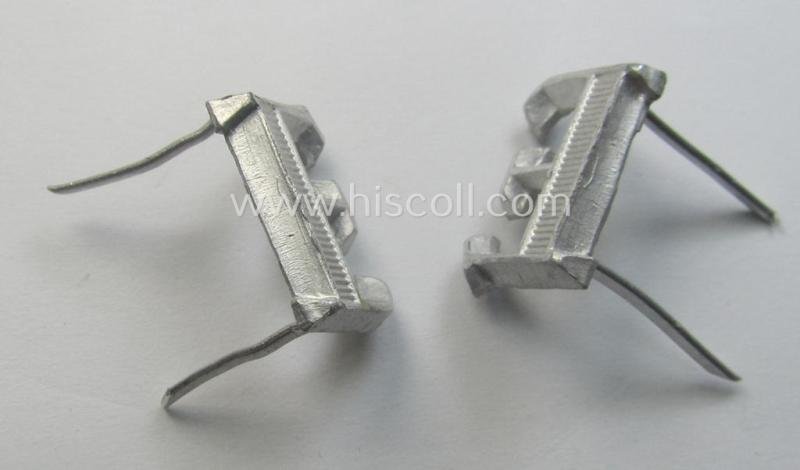 Pair of NCO-type- (thus silver-coloured), Waffen-SS- (ie. SS-VT-) related shoulderstrap-cyphers (ie. 'Schulterstückauflagen o. Ziffern') depicting a capital 'E'-character for usage by an NCO serving within the: 'Ergänzungsstellen der Waffen-SS' — image 2