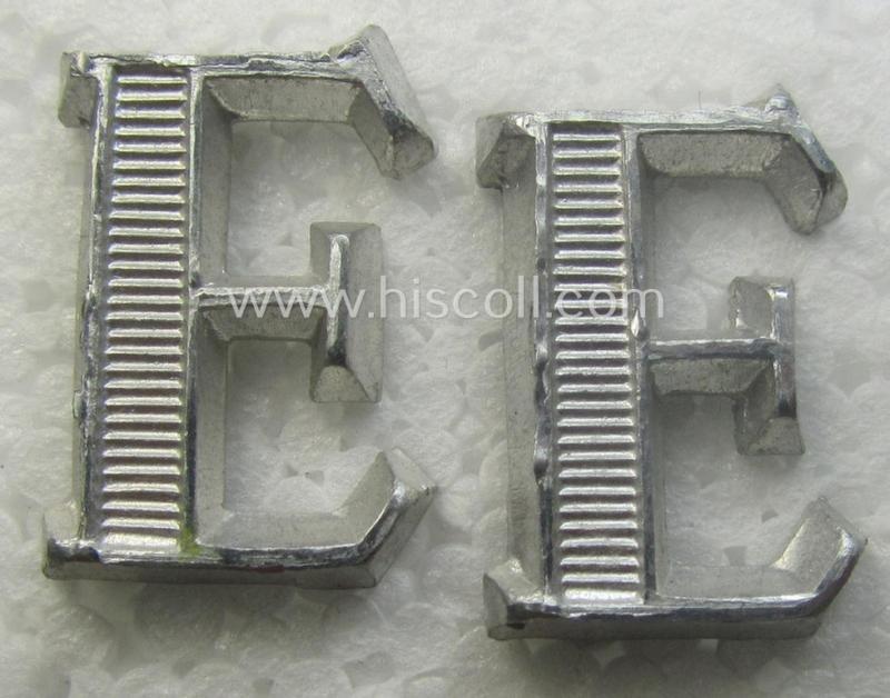 Pair of NCO-type- (thus silver-coloured), Waffen-SS- (ie. SS-VT-) related shoulderstrap-cyphers (ie. 'Schulterstückauflagen o. Ziffern') depicting a capital 'E'-character for usage by an NCO serving within the: 'Ergänzungsstellen der Waffen-SS' — image 4