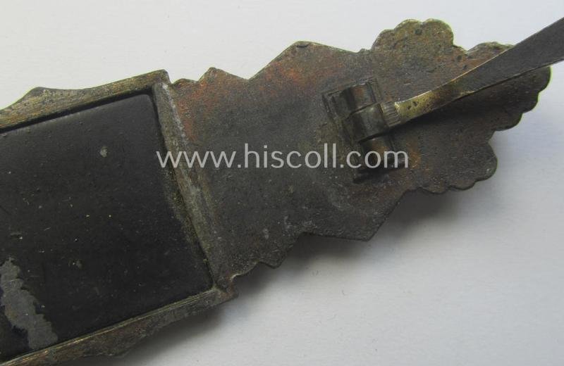 'Nahkampfspange in Bronze' (or: bronze-class close-combat clasp ie. CCC) being a maker- (ie. 'F.&B.-L.'-) marked- and/or minimally converse-shaped specimen as was produced by the maker- (ie. 'Hersteller') 'Funcke u. Brüninghaus' — image 6