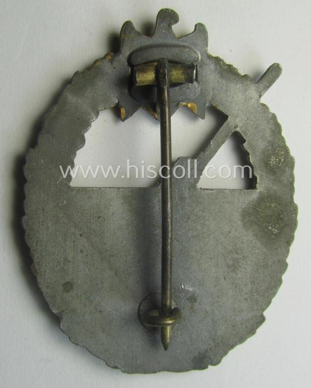 WH (Kriegsmarine) 'Marine-Artillerie-Abzeichen' being a non-maker-marked- and/or typical zinc- (ie. 'Feinzink'-) based example as was produced by the: 'Friedrich Linden'-company — image 4