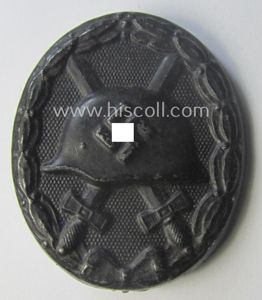 Maker- (ie. '63'-) marked example of a black-class wound-badge (or: …