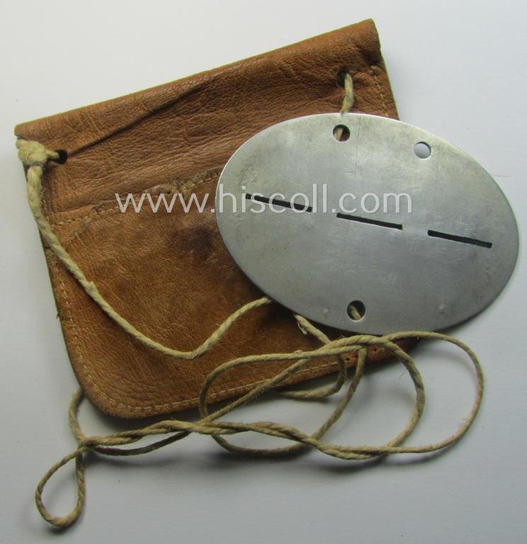 Aluminium-based, WH (Heeres-) transport (ie. 'Nachshub'-) related ID-disc, bearing the clearly stamped unit-designation: '4./Kf.Ers.Abt. 6' and that comes stored in its period- (and personalised!) pouch as issued and/or worn — image 5