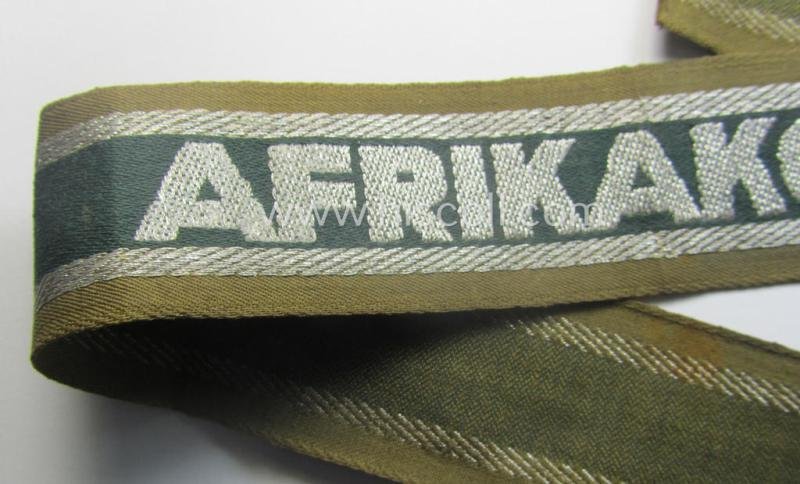 'BeVo'-like cuff-title (ie. 'Ärmelstreifen') entitled: 'Afrikakorps' being a presumably issued but simply never worn example that comes in an overall very nice- (ie. non-shortened- and never tunic-attached-), condition — image 2