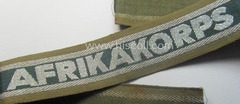 'BeVo'-like cuff-title (ie. 'Ärmelstreifen') entitled: 'Afrikakorps' being a presumably issued but simply never worn example that comes in an overall very nice- (ie. non-shortened- and never tunic-attached-), condition — image 3