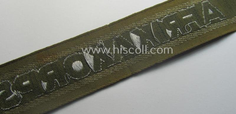 'BeVo'-like cuff-title (ie. 'Ärmelstreifen') entitled: 'Afrikakorps' being a presumably issued but simply never worn example that comes in an overall very nice- (ie. non-shortened- and never tunic-attached-), condition — image 5