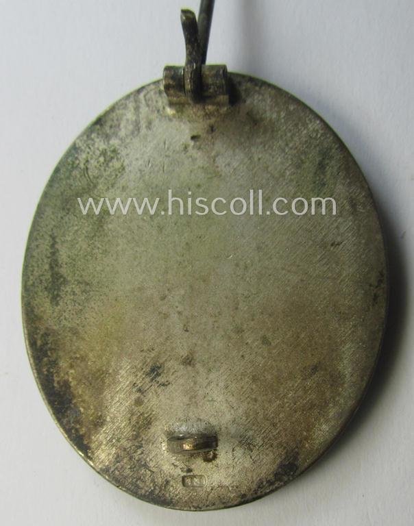 Unusually found, 'Verwundeten-Abzeichen in Silber' being a clearly maker- (ie. '13'-) marked, 'Buntmetall'-based example by the maker (ie. 'Hersteller') named: 'Gustav Brehmer' — image 3